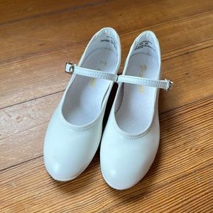 Brand new white Theatrical kid’s white size 11 M tap shoes.